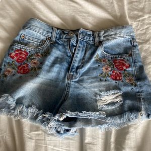 ripped hippie laundry jean shorts with flower embroidered designs
